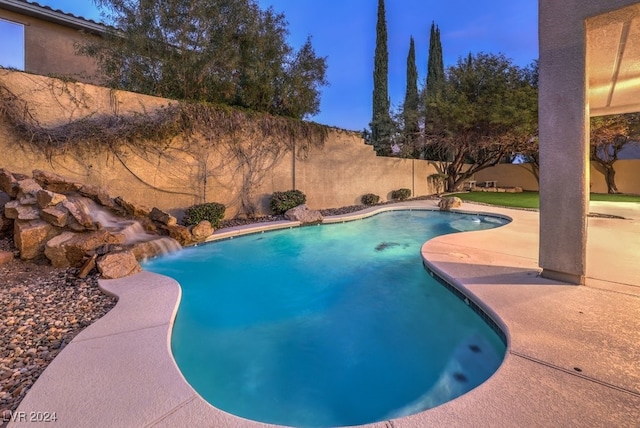 view of pool featuring pool water feature