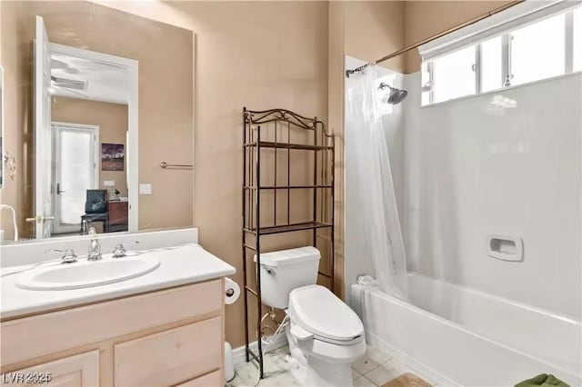 full bathroom with vanity, toilet, and shower / bath combo with shower curtain