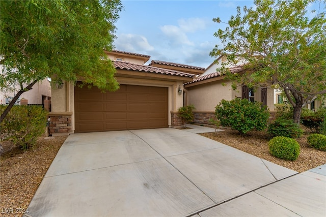 view of front of home featuring a garage