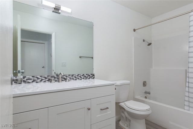 full bathroom with vanity,  shower combination, and toilet