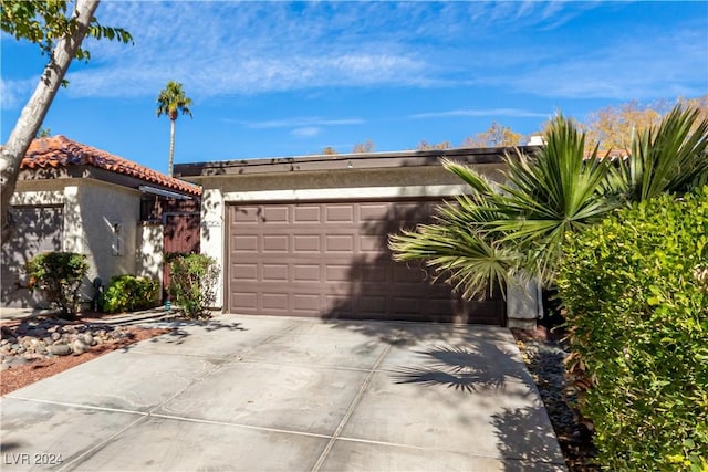 single story home featuring a garage