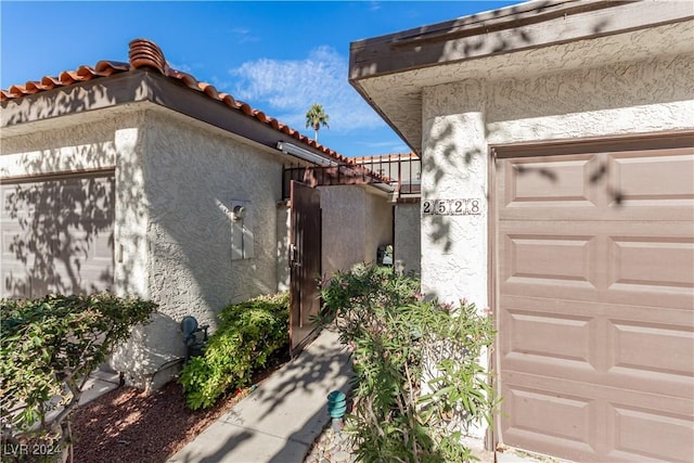 view of home's exterior with a garage