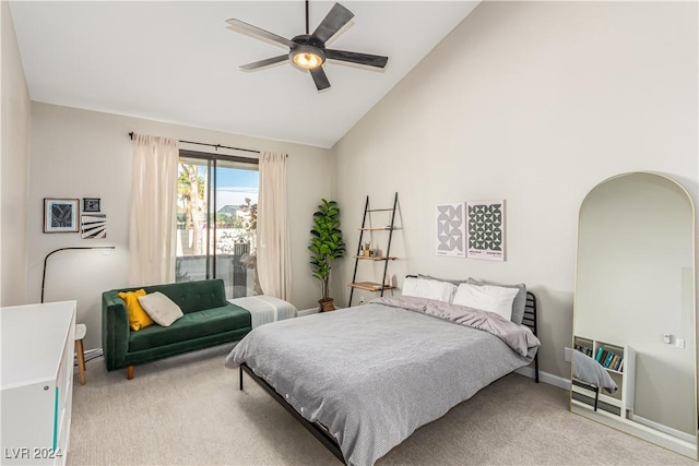 bedroom with lofted ceiling, light carpet, and ceiling fan