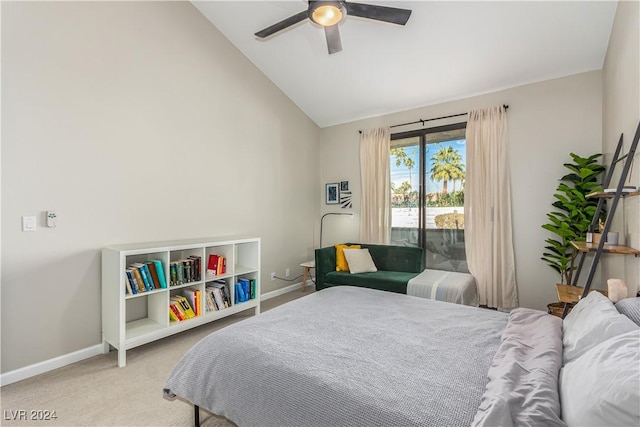 carpeted bedroom featuring access to outside, ceiling fan, and vaulted ceiling