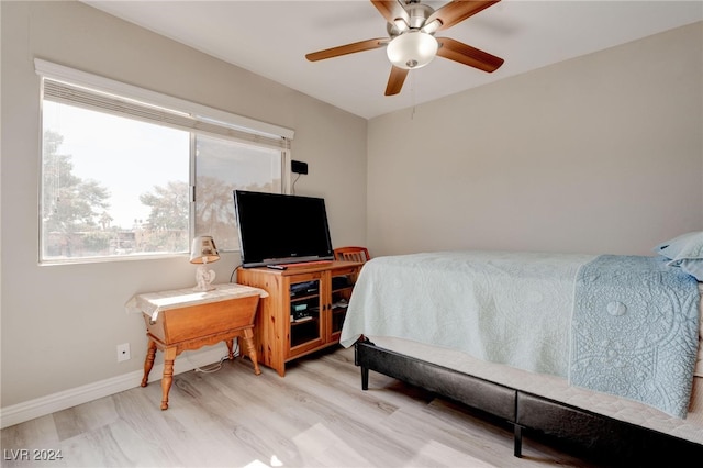 bedroom featuring ceiling fan and light wood-type flooring