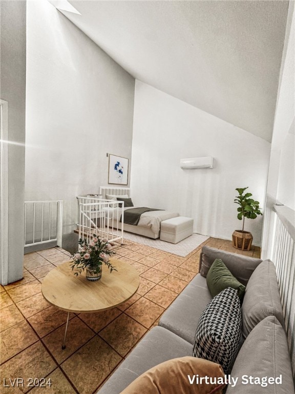 living room featuring tile patterned flooring, a wall unit AC, and vaulted ceiling