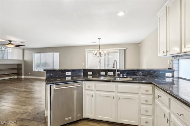 kitchen featuring white cabinets, ceiling fan with notable chandelier, sink, stainless steel dishwasher, and dark hardwood / wood-style floors