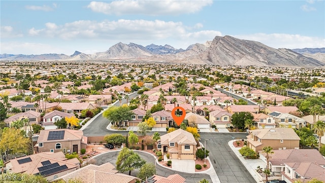 drone / aerial view featuring a mountain view