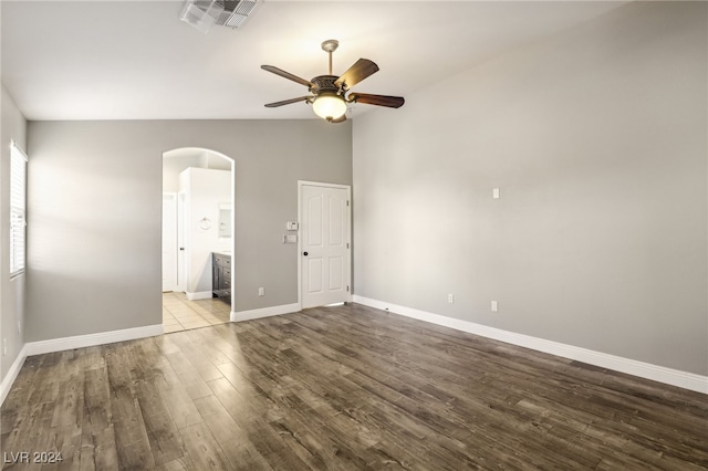 interior space with ceiling fan, vaulted ceiling, and light wood-type flooring