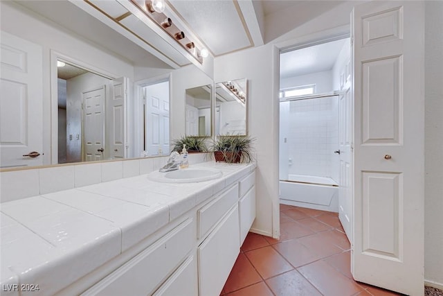 full bath with vanity, tile patterned floors, and tub / shower combination