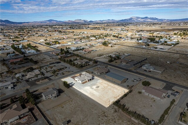 drone / aerial view featuring a mountain view