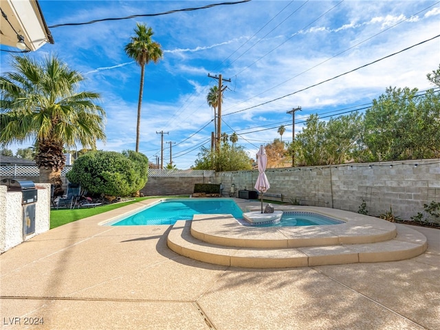 view of pool with a patio