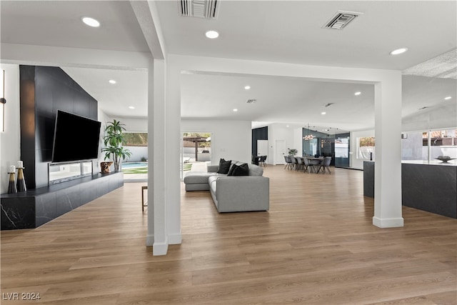 living room with light hardwood / wood-style floors