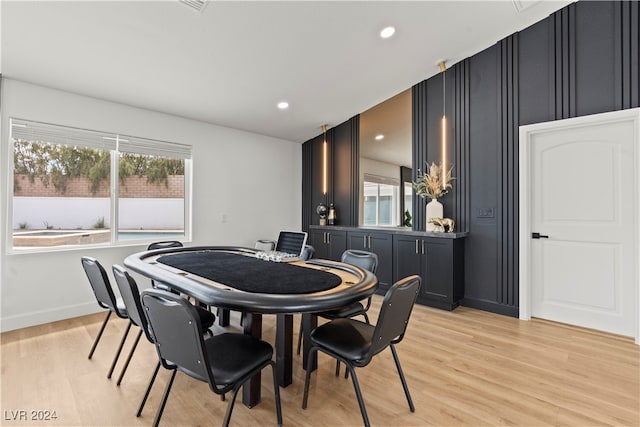 dining room with light hardwood / wood-style flooring