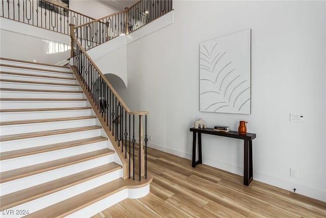 stairway with wood-type flooring