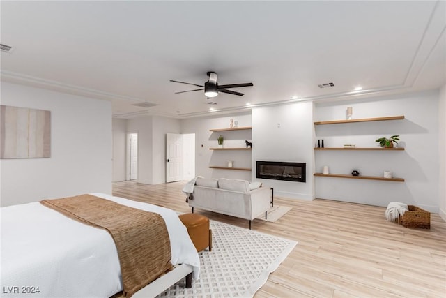 bedroom with ceiling fan and light hardwood / wood-style floors