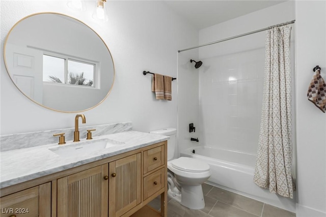 full bathroom with toilet, tile patterned flooring, shower / bath combo, and vanity