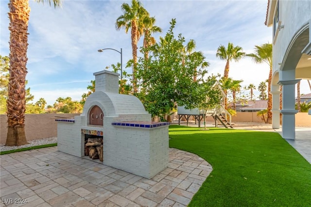 view of patio / terrace featuring an outdoor kitchen