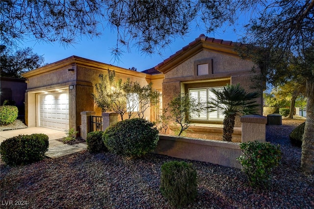 view of front of house with a garage