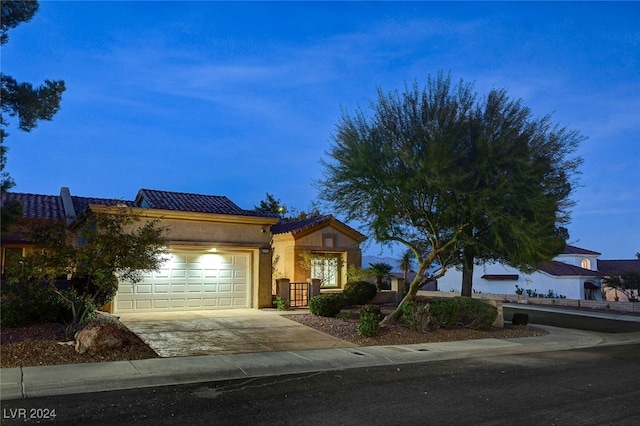 view of front of home with a garage