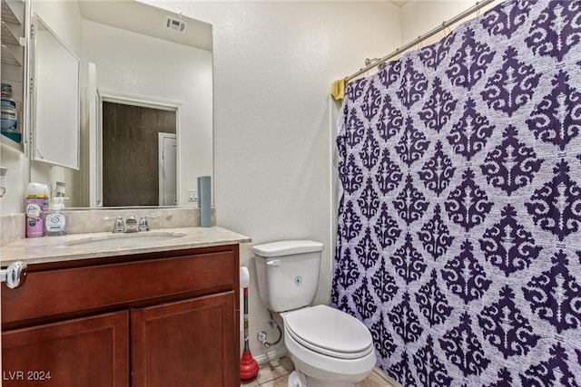 bathroom featuring tile patterned floors, vanity, toilet, and a shower with curtain