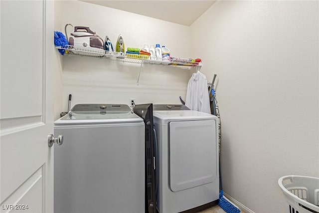 laundry area with washer and dryer and laundry area