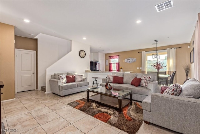 living room with light tile patterned flooring