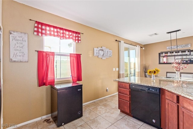 kitchen with decorative light fixtures, light tile patterned flooring, light stone counters, and black dishwasher