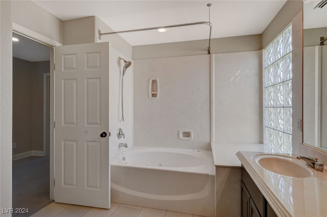 bathroom featuring shower / tub combination, tile patterned floors, and vanity