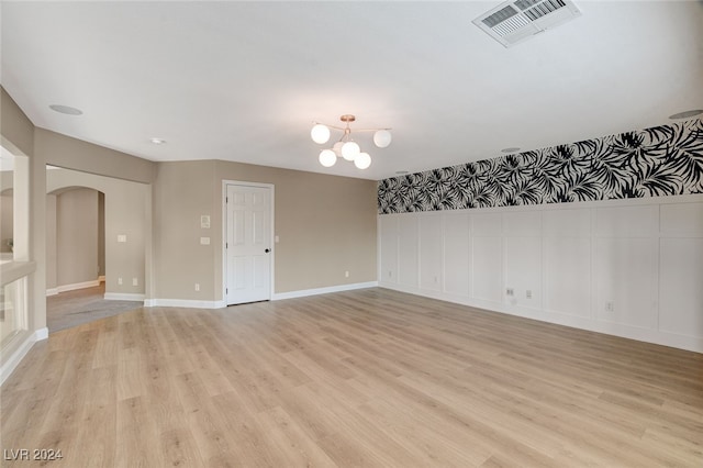 empty room with light wood-type flooring