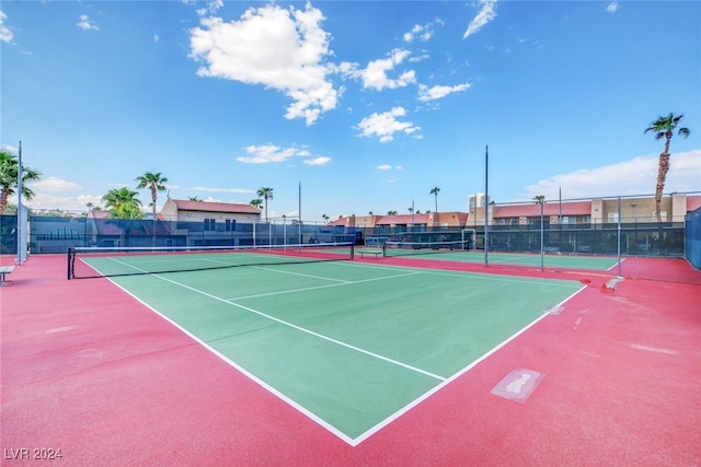 view of sport court with community basketball court and fence