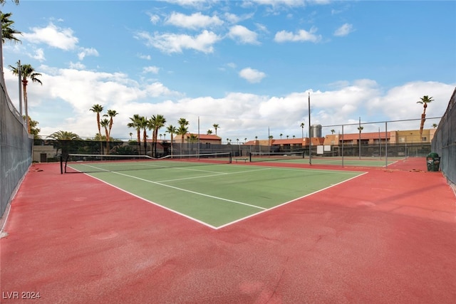 view of sport court featuring community basketball court and fence