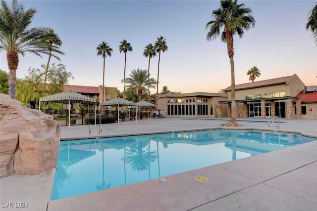 community pool with a patio