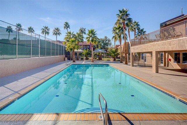 view of swimming pool featuring a patio