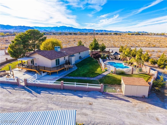 drone / aerial view featuring a mountain view