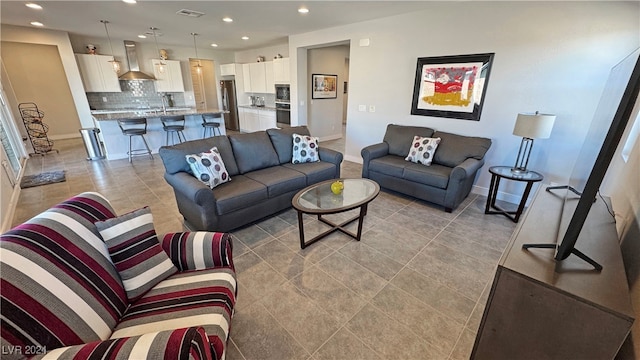 living room featuring light tile patterned flooring