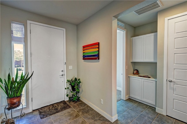 view of tiled entrance foyer