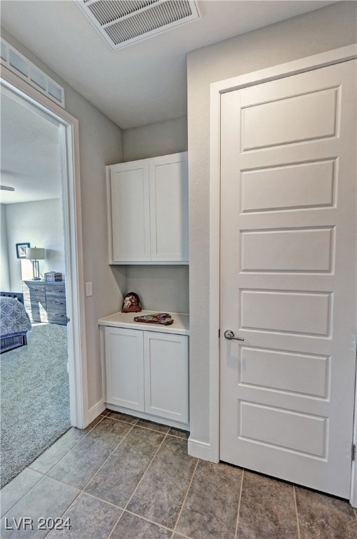 interior space with light colored carpet