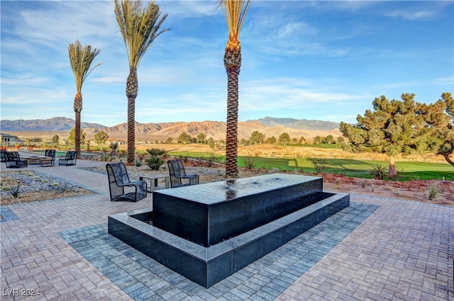 view of patio featuring a mountain view