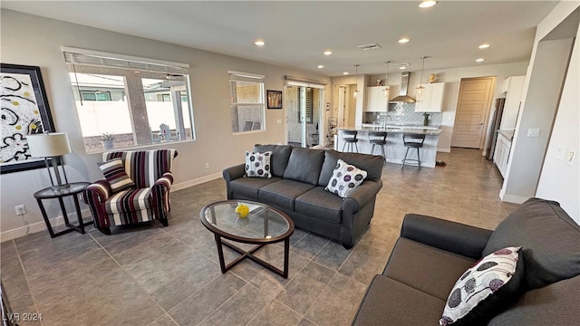 living room featuring sink