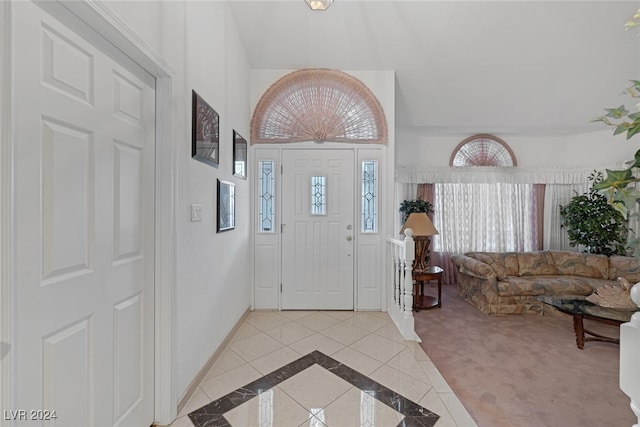 entrance foyer with carpet