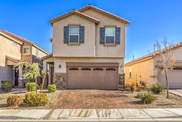 view of front of house with a garage