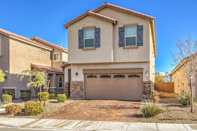 view of front of home with a garage