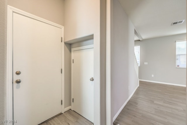 hall featuring light hardwood / wood-style flooring