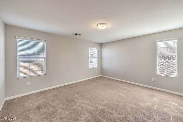 view of carpeted spare room