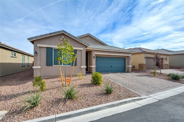 single story home featuring a garage