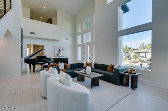 living room with a high ceiling