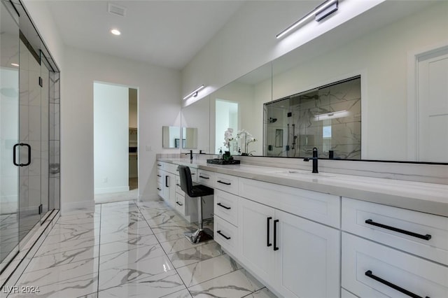 bathroom featuring vanity and walk in shower