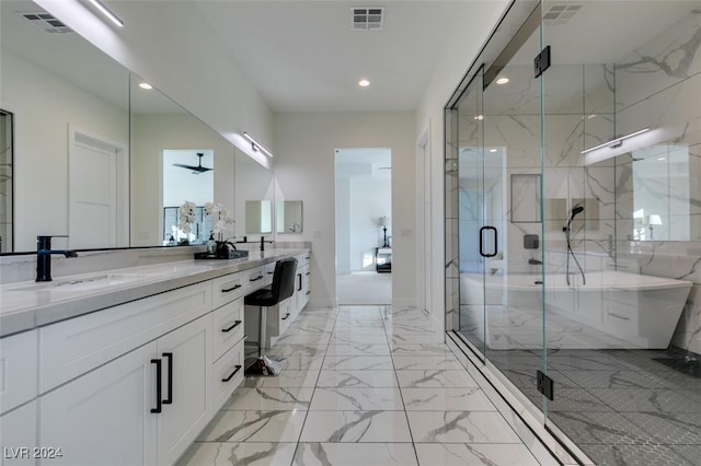 bathroom with vanity, ceiling fan, and an enclosed shower