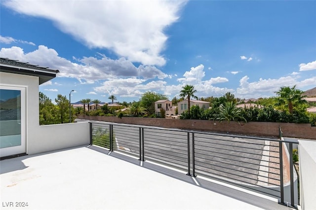 view of patio with a balcony